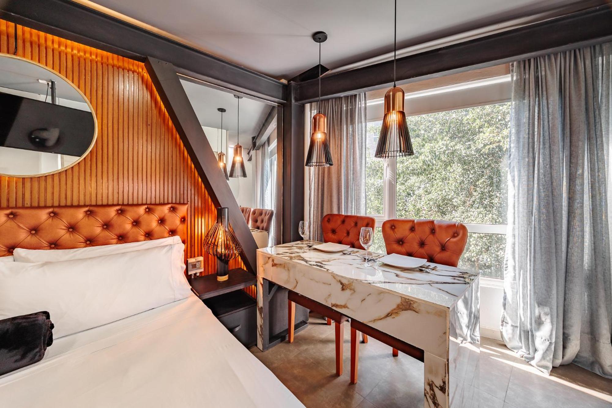 One Laureles Apartahotel
